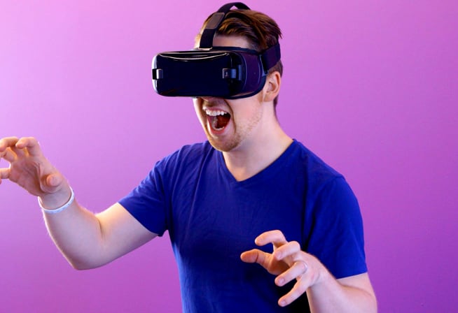 man using a virtual reality helmet 